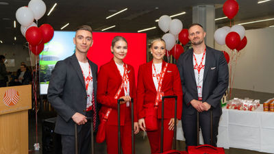 Play cabin crew celebrate the airline's first U.S. flight.
