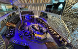 Going Beyond on Celebrity Cruises’ newest Edge-class ship. The Grand Plaza atrium, with the Martini Bar in the middle, was designed to create the energy of a European piazza.