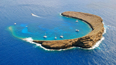 Molokini, a small crescent-shaped crater off the coast of Maui, is one of the Hawaiian destinations Kensington guests can visit.