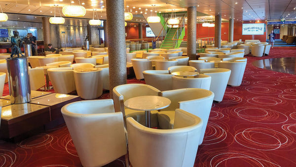 A seating area near the Margaritaville at Sea Paradise's Euphoria bar area. A seating area near the Margaritaville at Sea Paradise's Euphoria bar area.