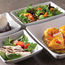It's trays down once again as U.S. airlines restore meal service