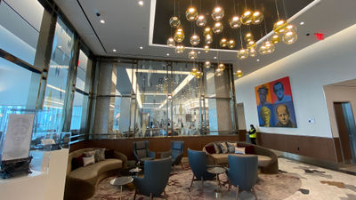 The elegant Delta Sky Club is enhanced by art displays.