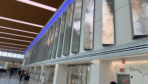 Vertical digital display panels will track flight departures in the TSA security hall.