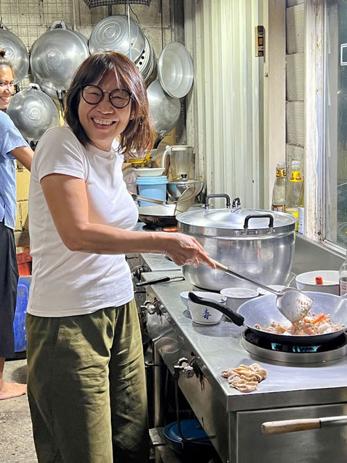 The author gets a cooking lesson from a chef in a local spot in Chiang Mai, one that doesn't have a name but is regularly visited by foodies in the know.