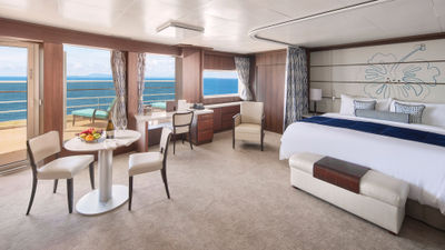 The Penthouse Suite on Norwegian Cruise Line's Pride of America features a large balcony and a heavy curtain that can be drawn around the bed, a plus for early birds.