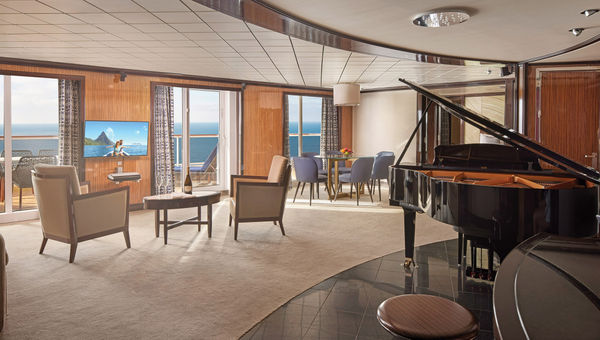 An Owner's Suite with a piano and a large balcony. An Owner's Suite with a piano and a large balcony.