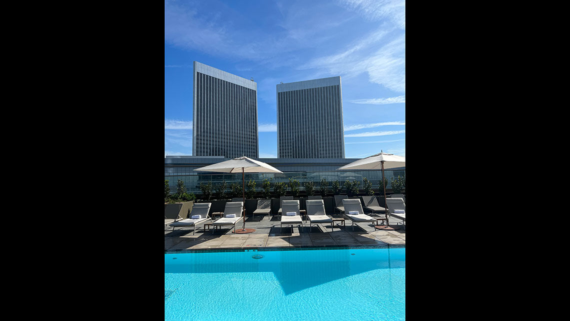 The Alcoa Towers are the backdrop of the rooftop pool at the Fairmont Century Plaza.