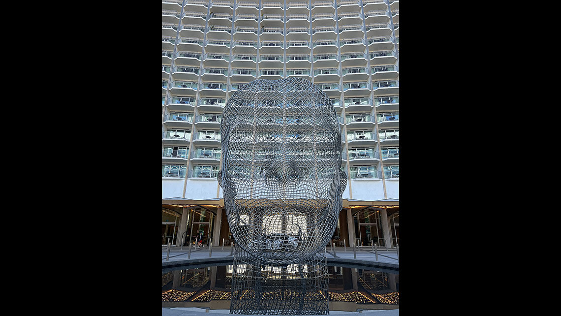 The 23-foot-tall sculpture "Laura" by sculptor Jaume Plensa, outside the Fairmont Century Plaza.