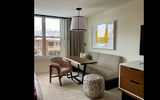 The sitting area in a room at the Limelight Aspen.