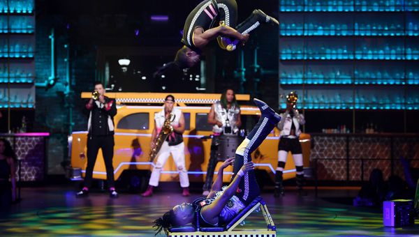 A cast of 48 performers, including acrobats and a five-piece band, share the stage at "Mad Apple" at New York-New York. A cast of 48 performers, including acrobats and a five-piece band, share the stage at "Mad Apple" at New York-New York.