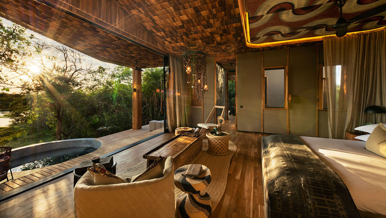 Guest tents at the new AndBeyond Grumeti Serengeti Tented Camp include deep baths and indoor showers as well as outdoor decks and private plunge pools..