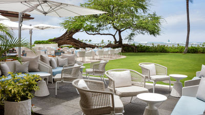 New lounge furniture in the scenic outdoor space of House Without A Key at Waikiki's Halekulani resort.