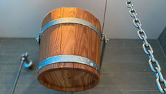After spending time in the steam room, an ice-cold bucket shower beckons.