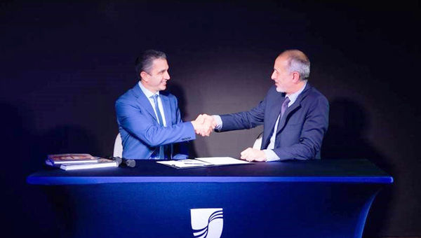 Seabourn president Josh Leibowitz (left) and T. Mariotti managing director Marco Ghiglione sign documents to complete the delivery of Seabourn Venture. Seabourn president Josh Leibowitz (left) and T. Mariotti managing director Marco Ghiglione sign documents to complete the delivery of Seabourn Venture.