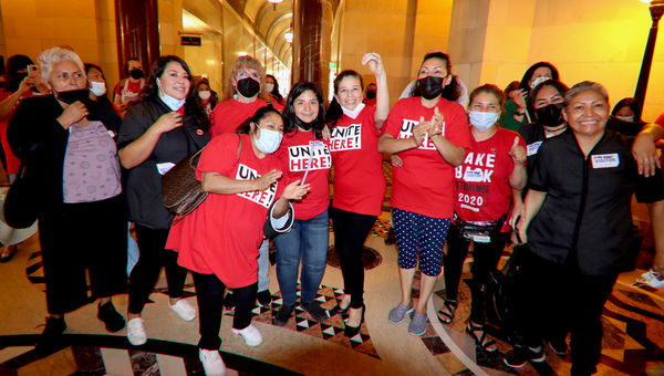 Unite Here Local 11 members react following the Los Angeles City Council's approval of the Hotel Worker Protection Initiative. Unite Here Local 11 members react following the Los Angeles City Council's approval of the Hotel Worker Protection Initiative.