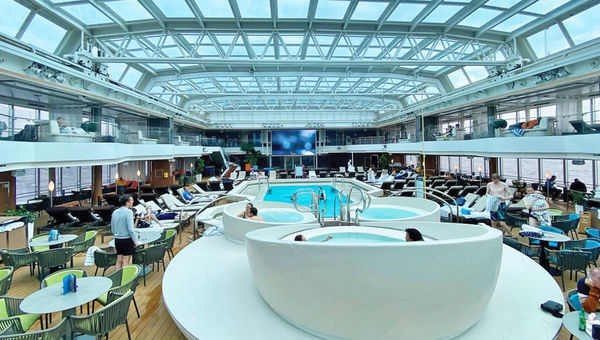 The Lido Pool on the Rotterdam has a retractable roof allowing for events to span three floors when opened. The Lido Pool on the Rotterdam has a retractable roof allowing for events to span three floors when opened.