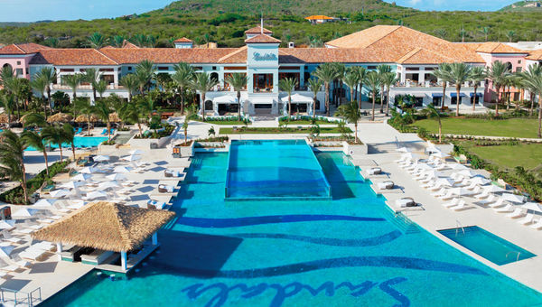 The Dos Awa bilevel infinity-edge pool is the centerpiece of the resort. The Dos Awa bilevel infinity-edge pool is the centerpiece of the resort.