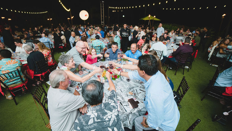 Attendees at one of the Hawaii Food & Wine Festival's seated dinners under the stars.