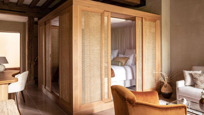 The renovated guestrooms at Le Relais Bernard Loiseau evoke the feeling of sleeping in a bird’s nest.