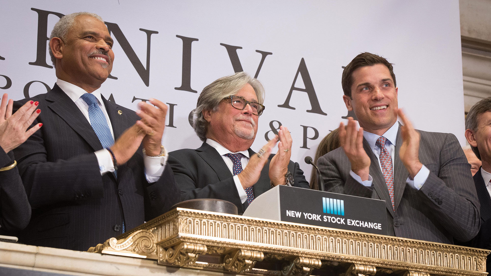 Arnold Donald and Micky Arison (center) at the New York Stock Exchange in 2016.