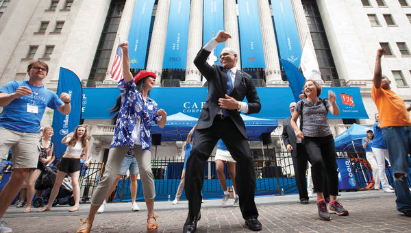 Arnold Donald celebrates Carnival Corp. Day and Cunard's 175th anniversary at the New York Stock Exchange in 2015.