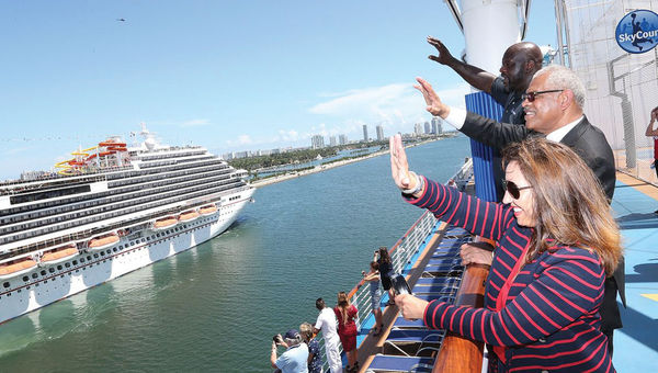 Carnival spokesman Shaquille O'Neal, Arnold Donald and Carnival Cruise Line president Christine Duffy await the Carnival Horizon's arrival in Miami in 2018.