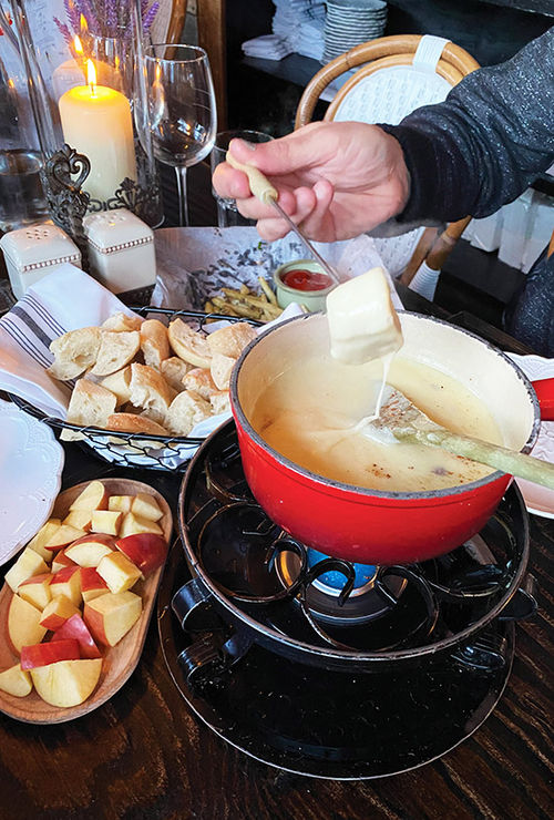 Fondue at the French Alpine Bistro, Creperie du Village. Fondue at the French Alpine Bistro, Creperie du Village.