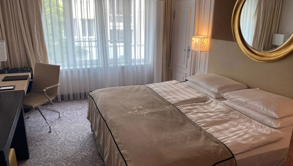 A guestroom at the Hotel Vier Jahreszeiten Kempinski in the heart of Munich.