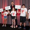 Different conference, same message: Virgin's John Diorio appeared at Global Travel Marketplace in 2022 with a group of kids "protesting" Virgin's no-children policy.
