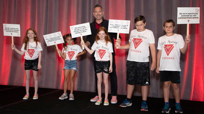 Kids "protest" Virgin Voyages' adults-only policy with breakfast sponsor John Diorio, vice president North American sales for Virgin Voyages.