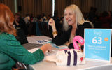 Tracy Lavender, Lavender Custom Travel, is all smiles during a one-on-one appointment.