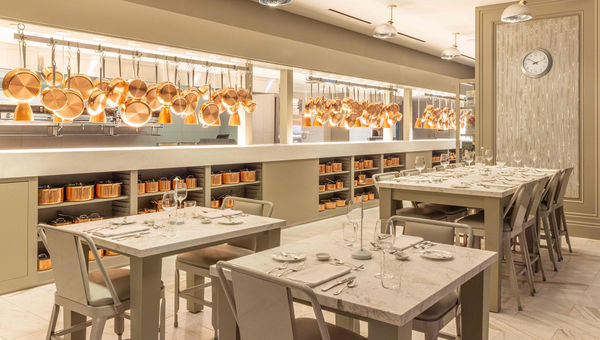 A hanging display of bright copper pans adorn the view of the open kitchen at the Bedford by Martha Stewart, a new restaurant at Paris Las Vegas. A hanging display of bright copper pans adorn the view of the open kitchen at the Bedford by Martha Stewart, a new restaurant at Paris Las Vegas.