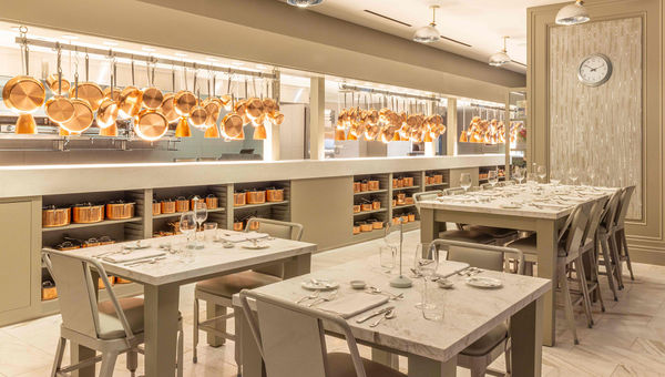 A hanging display of bright copper pans adorn the view of the open kitchen at the Bedford by Martha Stewart, a new restaurant at Paris Las Vegas.