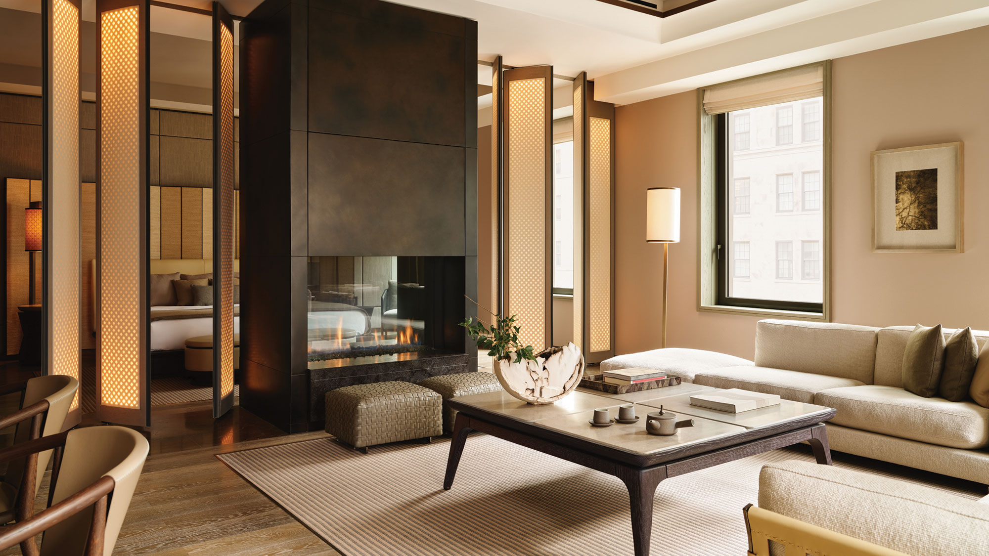 The living room in a Corner Suite accommodation at the Aman New York; the suite offers a flexible layout.