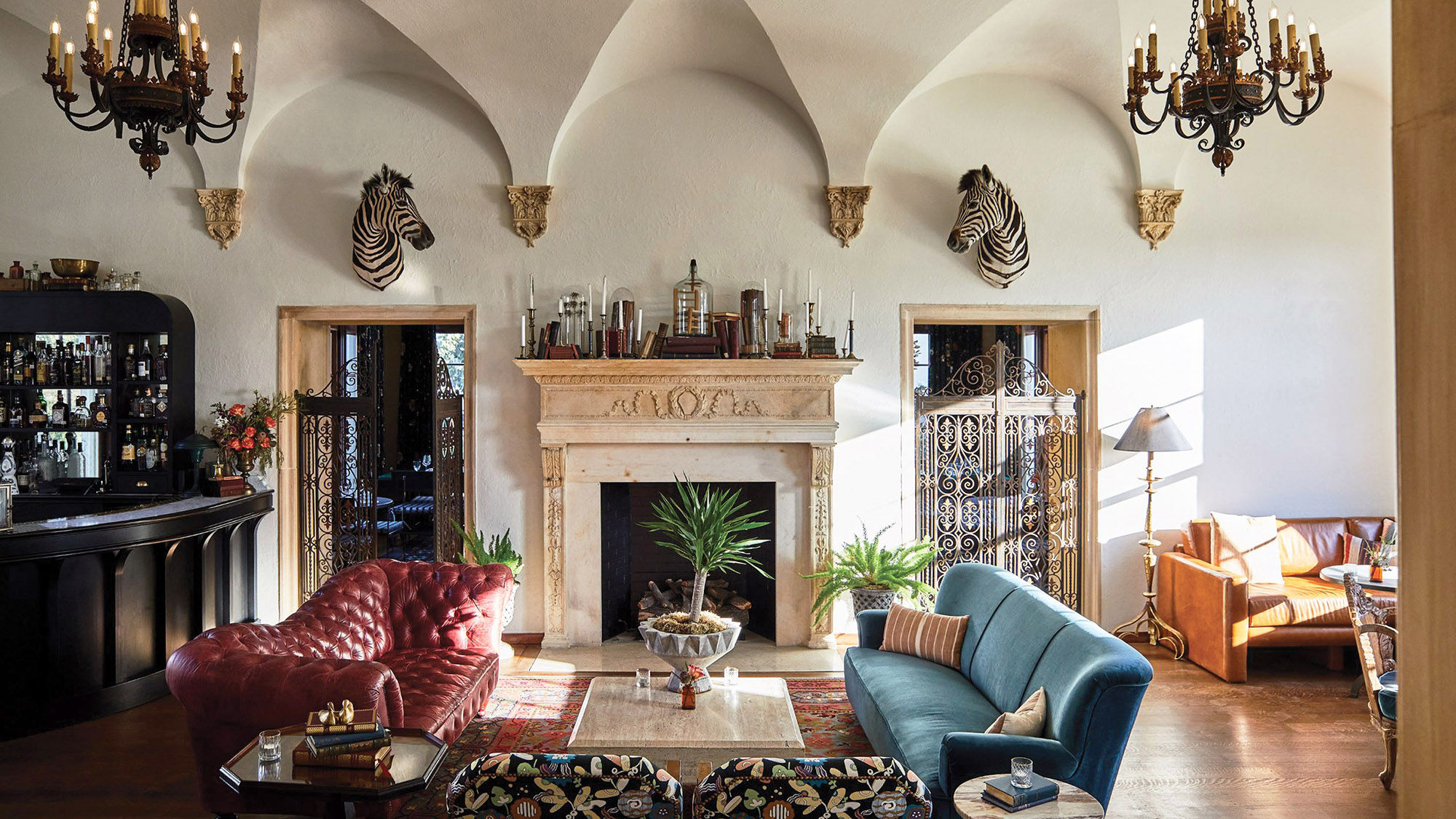 Eclectic furnishings make the mansion living room feel more like home than a hotel.