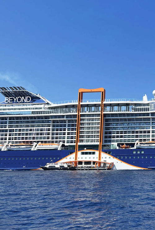 The Magic Carpet, an Edge-class innovation, lowered to the waterline in order to serve as a tender platform. The Magic Carpet, an Edge-class innovation, lowered to the waterline in order to serve as a tender platform.