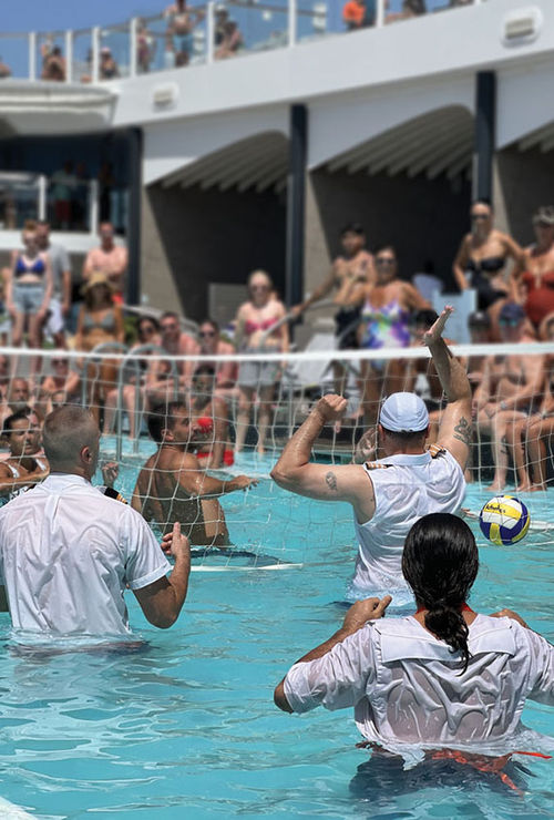 The officers vs. guests volleyball game, which attracted a big turnout on the last sea day. The officers vs. guests volleyball game, which attracted a big turnout on the last sea day.
