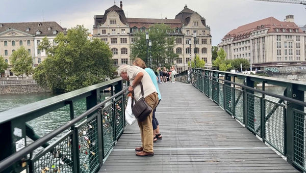 A footbridge to Old Town in Zurich. Uniworld's Venice & the Swiss Alps journey begins with an overnight stay in the city. A footbridge to Old Town in Zurich. Uniworld's Venice & the Swiss Alps journey begins with an overnight stay in the city.