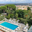 The outdoor swimming pools at the Rome Cavalieri, a Waldorf Astoria Hotel, with the city beyond.