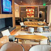 The cozy living-room vibe of Bayou & Bottles at the Four Seasons Hotel Houston.