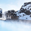 Steam rises from the therapeutic geothermal waters at the Retreat at Blue Lagoon Iceland.