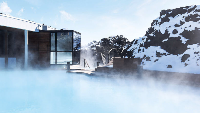 Steam rises from the therapeutic geothermal waters at the Retreat at Blue Lagoon Iceland.