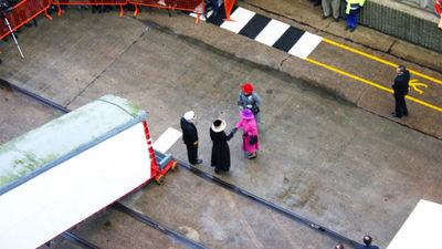 Queen Elizabeth II shakes hands with Pamela Conover, then president of Cunard, at the gangway to the Queen Mary 2 during its inaugural festivities in 2004. The Queen was the ship's godmother.