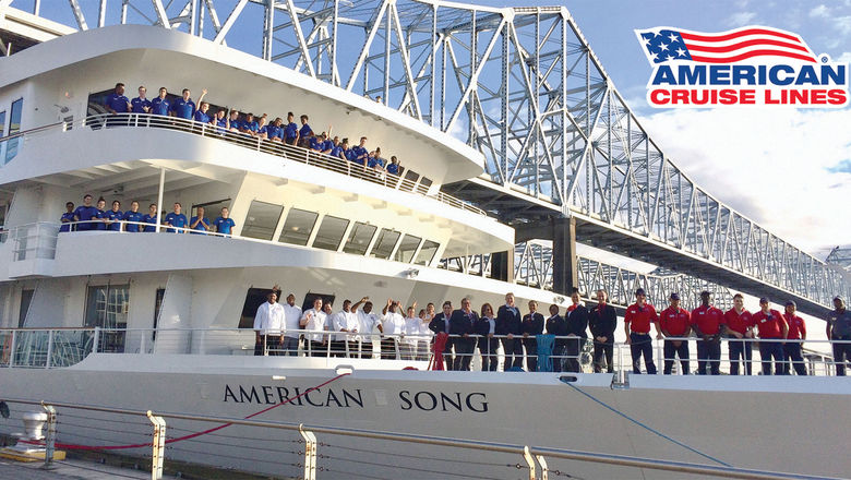 An American Cruise Lines promotional photo for new recruits, featuring crew members on the American Song in Port Nola, Louisiana.