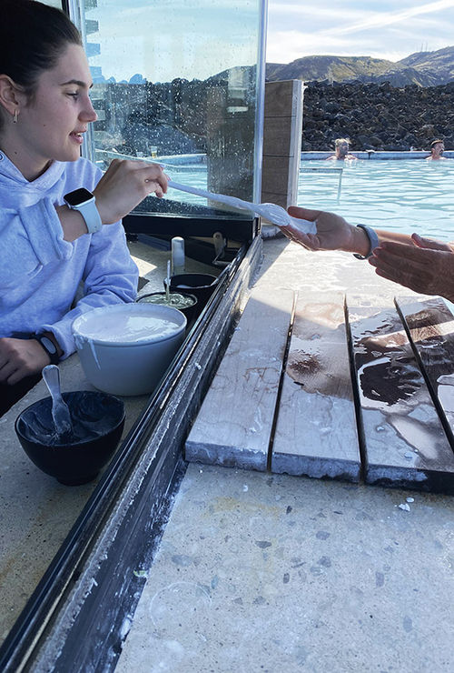 Staff at the Blue Lagoon dispense dollops of their signature silica mud mask, said to purify the skin, minimize pores and leave skin less shiny. Staff at the Blue Lagoon dispense dollops of their signature silica mud mask, said to purify the skin, minimize pores and leave skin less shiny.