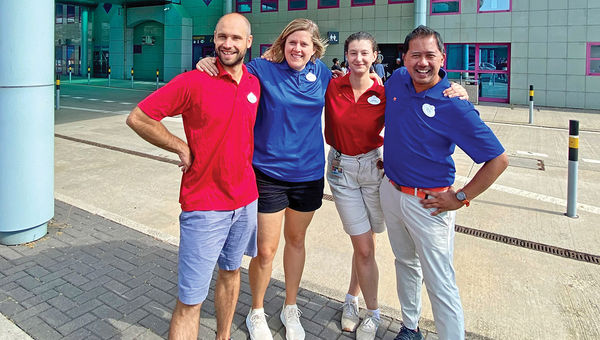 Adventures by Disney Adventure Guides, from left, George, Michaela, Emma and Dean pose for a picture and keep up spirits on a rest stop on the Austria-Slovakia border.