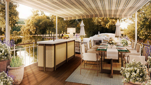 Upper-deck dining on the Belmond Coquelicot river barge. Upper-deck dining on the Belmond Coquelicot river barge.