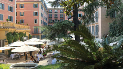 Looking back at the Hotel de Russie from its gardens in the rear, with the Jardin de Russie restaurant visible below.