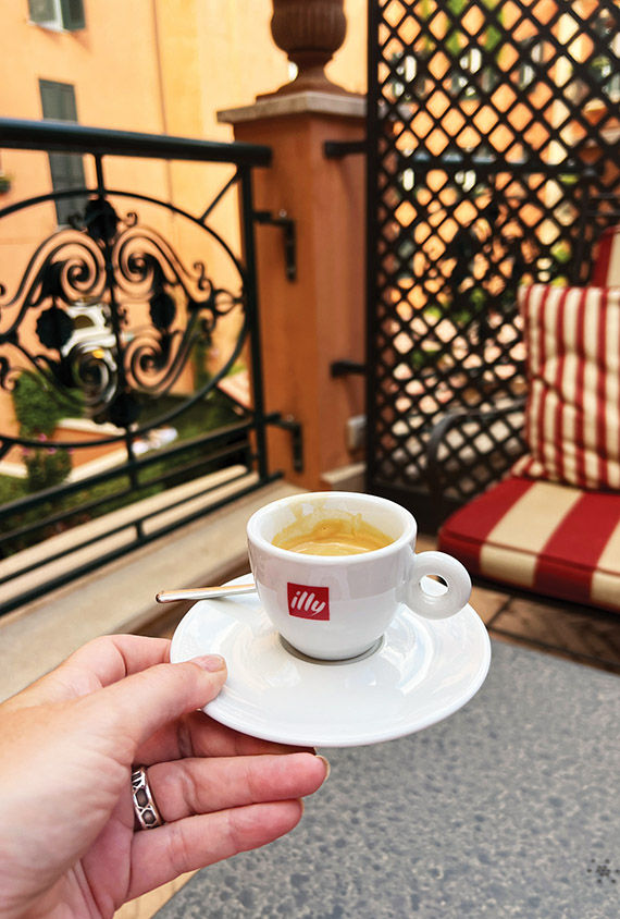 Taking one's morning espresso to the terrace of the Grand Suite With Terrace.