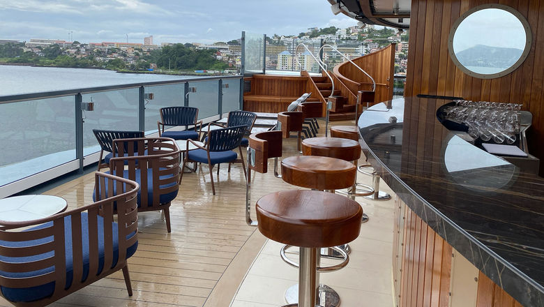 The Sky Bar high up on the Seabourn Venture's aft is a hidden-away spot with two hot tubs, lounge chairs and cushioned seating.